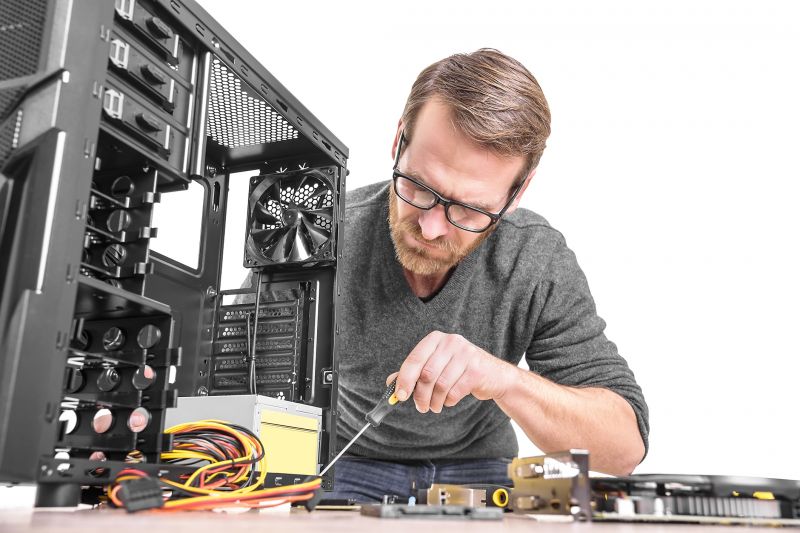 Technician Working on Computer